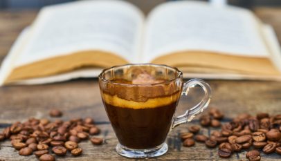 clear glass teacup with coffee beverage