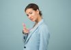 woman wearing blue shawl lapel suit jacket
