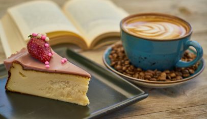coffee and cake near book